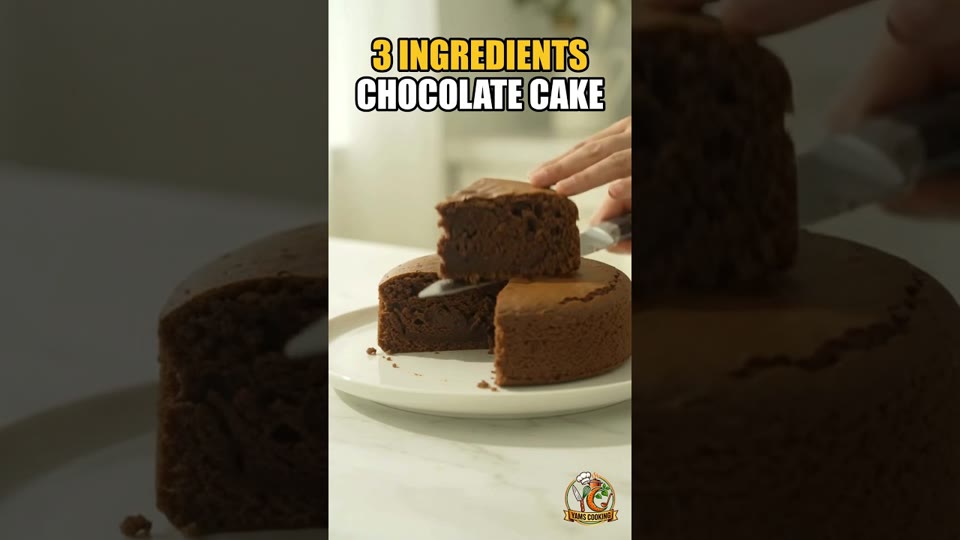 A chocolate cake cut open to show the crumb